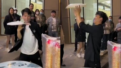 The image features a street vendor showing his impressive dough-rolling skills. (Twitter/@cctvidiots) The image features a street vendor showing his impressive dough-rolling skills. (Twitter/@cctvidiots)