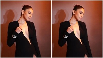 Rakul Preet looked every bit gorgeous in the figure-hugging sleek black gown with a cut out detail at the torso featuring a see-through netted detail, a thigh high slit and full sleeves.&nbsp; (Instagram/@rakulpreet)