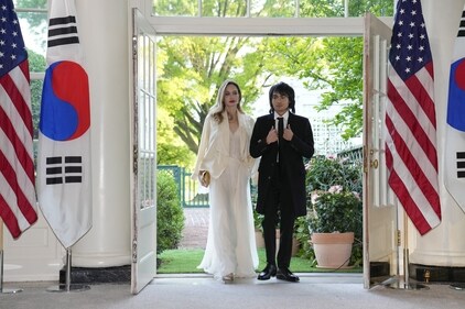 Angelina Jolie and Maddox arrive for the state dinner. (AP) Angelina Jolie and Maddox arrive for the state dinner. (AP)