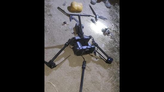 The drone carrying drugs that was shot down by the Border Security Force at Dhanoe Kalan village in the Amritsar sector early on Thursday. (HT Photo)