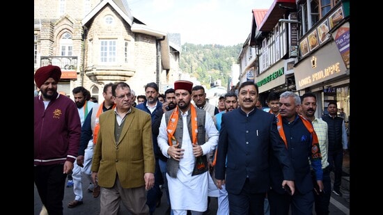 Union minister Anurag Thakur during a road show in Shimla on Thursday. (Deepak Sansta/HT)