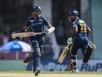 Gujarat Titans' Wriddhiman Saha (L) and Hardik Pandya run between the wickets during the Indian Premier League (IPL) Twenty20 cricket match between Lucknow Super Giants and Gujarat Titans at the Ekana Cricket Stadium in Lucknow on April 22, 2023. (Photo by Arun SANKAR / AFP) Gujarat Titans' Wriddhiman Saha (L) and Hardik Pandya run between the wickets during the Indian Premier League (IPL) Twenty20 cricket match between Lucknow Super Giants and Gujarat Titans at the Ekana Cricket Stadium in Lucknow on April 22, 2023. (Photo by Arun SANKAR / AFP)