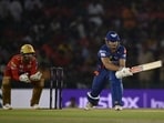 Lucknow Super Giants' Marcus Stoinis (R) plays a shot during the Indian Premier League (IPL) Twenty20 cricket match between Punjab Kings and Lucknow Super Giants Lucknow Super Giants' Marcus Stoinis (R) plays a shot during the Indian Premier League (IPL) Twenty20 cricket match between Punjab Kings and Lucknow Super Giants