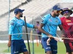 Kolkata: Gujarat Titans skipper Hardik Pandya and Mohammed Shami share light moments with KKR bowling coach Bharat Arun(C) during a training session on the eve of IPL 2023 match against Kolkata Knight Riders, in Kolkata, Friday, April 28, 2023. (PTI Photo/Swapan Mahapatra)  (PTI04_28_2023_000246B)