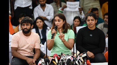 Bajrang Punia, Vinesh Phogat and Sakshi Malik at Jantar Mantar in New Delhi on Friday. (Sanchit Khanna/HT Photo) Bajrang Punia, Vinesh Phogat and Sakshi Malik at Jantar Mantar in New Delhi on Friday. (Sanchit Khanna/HT Photo)