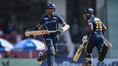 Gujarat Titans' Wriddhiman Saha (L) and Hardik Pandya run between the wickets during the Indian Premier League (IPL) Twenty20 cricket match between Lucknow Super Giants and Gujarat Titans at the Ekana Cricket Stadium in Lucknow on April 22, 2023. (Photo by Arun SANKAR / AFP) (AFP) Gujarat Titans' Wriddhiman Saha (L) and Hardik Pandya run between the wickets during the Indian Premier League (IPL) Twenty20 cricket match between Lucknow Super Giants and Gujarat Titans at the Ekana Cricket Stadium in Lucknow on April 22, 2023. (Photo by Arun SANKAR / AFP) (AFP)