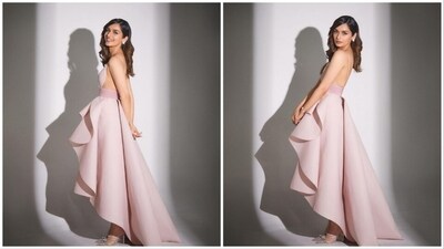 Manushi Chhillar dolled up for the event wearing a pink asymmetrical backless gown by Surya Sarkar. (Instagram/@manushi_chhillar) Manushi Chhillar dolled up for the event wearing a pink asymmetrical backless gown by Surya Sarkar. (Instagram/@manushi_chhillar)
