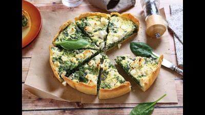 For King Charles’s Coronation, the Palace has gone with the Coronation Quiche containing milk, double cream, cheddar cheese, spinach and broad beans. (Shutterstock) For King Charles’s Coronation, the Palace has gone with the Coronation Quiche containing milk, double cream, cheddar cheese, spinach and broad beans. (Shutterstock)