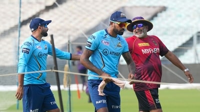 Kolkata: Gujarat Titans skipper Hardik Pandya and Mohammed Shami share light moments with KKR bowling coach Bharat Arun(C) during a training session on the eve of IPL 2023 match against Kolkata Knight Riders, in Kolkata, Friday, April 28, 2023. (PTI Photo/Swapan Mahapatra) (PTI04_28_2023_000246B) (PTI) Kolkata: Gujarat Titans skipper Hardik Pandya and Mohammed Shami share light moments with KKR bowling coach Bharat Arun(C) during a training session on the eve of IPL 2023 match against Kolkata Knight Riders, in Kolkata, Friday, April 28, 2023. (PTI Photo/Swapan Mahapatra) (PTI04_28_2023_000246B) (PTI)