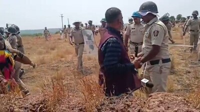 Police in action against villagers in Barsu during a protest against the proposed petrochemical refinery project in the area, at Rajapur taluka in Ratnagiri district, Friday. (PTI) Police in action against villagers in Barsu during a protest against the proposed petrochemical refinery project in the area, at Rajapur taluka in Ratnagiri district, Friday. (PTI)