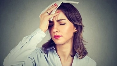 Hot flashes and night sweats: These sudden and intense bursts of heat can occur during sleep and cause discomfort, resulting in frequent awakenings. To manage them, avoid spicy foods, alcohol, caffeine, and smoking, as they can trigger hot flashes. (Shutterstock)