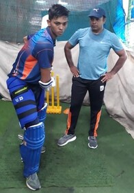 Yashasvi Jaiswal with coach Jwala Singh (R) Yashasvi Jaiswal with coach Jwala Singh (R)