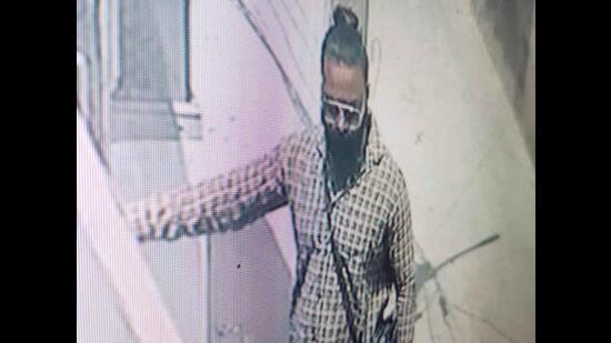 A video grab of one of the accused outside the armyman’s house in Sunet village in Ludhiana. (HT Photo)
