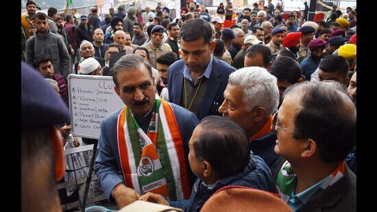 Chief minister Sukhvinder Singh Sukhu meets people during an election campaign in Shimla. (HT Photo)