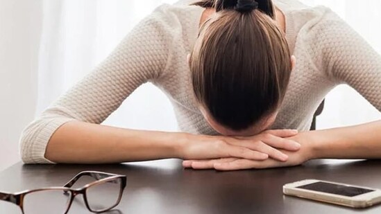 Fatigue: Sleep disturbances during menopause can lead to daytime fatigue and drowsiness. To manage fatigue, take short naps during the day and avoid large meals, caffeine, and alcohol before bedtime.(Shutterstock)