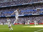 Karim Benzema celebrates after scoring against Almeria at the Santiago Bernabeu Stadium in Madrid Karim Benzema celebrates after scoring against Almeria at the Santiago Bernabeu Stadium in Madrid