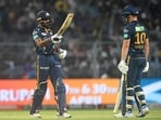 Gujarat Titans' Vijay Shankar (L) celebrates after scoring a half-century (50 runs) during the Indian Premier League (IPL) Twenty20 cricket match Gujarat Titans' Vijay Shankar (L) celebrates after scoring a half-century (50 runs) during the Indian Premier League (IPL) Twenty20 cricket match