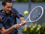 Daniil Medvedev, of Russia, returns the ball to Andrea Vavassori of Italy during their match at the Madrid Open tennis tournament in Madrid, Spain, Saturday, April 29, 2023. (AP Photo/Manu Fernandez)