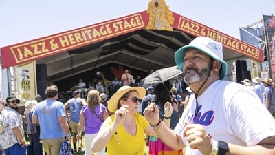 Festivalgoers are seen at the 2023 New Orleans Jazz & Heritage Festival at the Fair Grounds Race Course in New Orleans. (Photo by Amy Harris/Invision/AP) Festivalgoers are seen at the 2023 New Orleans Jazz & Heritage Festival at the Fair Grounds Race Course in New Orleans. (Photo by Amy Harris/Invision/AP)