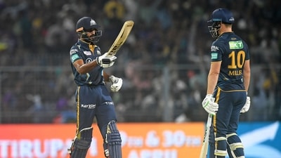 Gujarat Titans' Vijay Shankar (L) celebrates after scoring a half-century (50 runs) during the Indian Premier League (IPL) Twenty20 cricket match (AFP) Gujarat Titans' Vijay Shankar (L) celebrates after scoring a half-century (50 runs) during the Indian Premier League (IPL) Twenty20 cricket match (AFP)