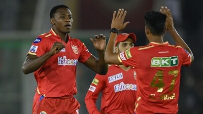 Punjab Kings' Kagiso Rabada (L) celebrates with teammates after taking the wicket of Lucknow Super Giants' KL Rahul (not pictured) during the Indian Premier League (IPL) Twenty20 cricket match between Punjab Kings and Lucknow Super Giants at the Punjab Cricket Association Stadium in Mohali on April 28, 2023. (Photo by Arun SANKAR / AFP) (AFP) Punjab Kings' Kagiso Rabada (L) celebrates with teammates after taking the wicket of Lucknow Super Giants' KL Rahul (not pictured) during the Indian Premier League (IPL) Twenty20 cricket match between Punjab Kings and Lucknow Super Giants at the Punjab Cricket Association Stadium in Mohali on April 28, 2023. (Photo by Arun SANKAR / AFP) (AFP)