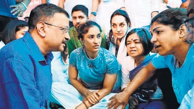 Delhi Chief Minister Arvind Kejriwal speaks to wrestler Sakshi Malik at Jantar Mantar in New Delhi on Saturday. (AAP Twitter) Delhi Chief Minister Arvind Kejriwal speaks to wrestler Sakshi Malik at Jantar Mantar in New Delhi on Saturday. (AAP Twitter)