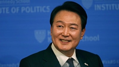 South Korea's President Yoon Suk Yeol​​ smiles while taking questions following an address at The Institute of Politics at the Harvard Kennedy School. (AP)
