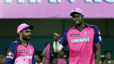 Guwahati: Rajasthan Royals captain Sanju Samson with teammate Jason Holder during the IPL 2023 cricket match between Rajasthan Royals and Punjab Kings, at ACA Stadium, Barsapara in Guwahati, Wednesday, April 5, 2023. (PTI Photo)(PTI04_05_2023_000334B) (PTI) Guwahati: Rajasthan Royals captain Sanju Samson with teammate Jason Holder during the IPL 2023 cricket match between Rajasthan Royals and Punjab Kings, at ACA Stadium, Barsapara in Guwahati, Wednesday, April 5, 2023. (PTI Photo)(PTI04_05_2023_000334B) (PTI)