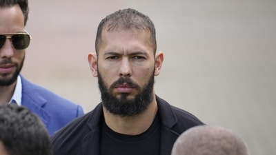 Andrew Tate leave the Bucharest Tribunal, in Bucharest, Romania, Friday, April 21, 2023. (AP)