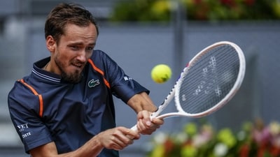 Daniil Medvedev, of Russia, returns the ball to Andrea Vavassori of Italy during their match at the Madrid Open tennis tournament in Madrid, Spain, Saturday, April 29, 2023. (AP Photo/Manu Fernandez) (AP) Daniil Medvedev, of Russia, returns the ball to Andrea Vavassori of Italy during their match at the Madrid Open tennis tournament in Madrid, Spain, Saturday, April 29, 2023. (AP Photo/Manu Fernandez) (AP)