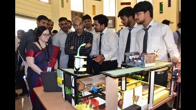 Students explaining their models to dignitaries during the exhibition. (HT PHOTO)