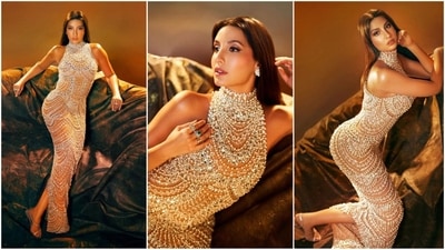 Nora Fatehi stole the show at the 68th Filmfare Awards with her sizzling hot look in a sheer embellished bodycon gown. The actress left everyone in awe as she walked the red carpet, and her pictures have been the talk of the town ever since. Nora's fashion sense is on point and she knows exactly how to make heads turn with her stunning ensembles. (Instagram/@norafatehi) Nora Fatehi stole the show at the 68th Filmfare Awards with her sizzling hot look in a sheer embellished bodycon gown. The actress left everyone in awe as she walked the red carpet, and her pictures have been the talk of the town ever since. Nora's fashion sense is on point and she knows exactly how to make heads turn with her stunning ensembles. (Instagram/@norafatehi)