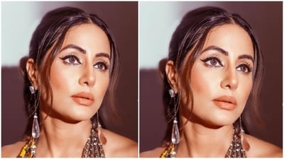 Hina looked every bit gorgeous in a yellow and silver see-through gown featuring shimmery details, a plunging neckline, and body-hugging patterns cascading throughout the length.&nbsp; (Instagram/@realhinakhan)