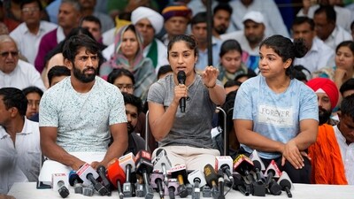 Wrestlers Bajrang Punia, Vinesh Phogat and Sakshi Malik speak with the media during their protest at Jantar Mantar, in New Delhi, Saturday, April 29, 2023. (PTI) Wrestlers Bajrang Punia, Vinesh Phogat and Sakshi Malik speak with the media during their protest at Jantar Mantar, in New Delhi, Saturday, April 29, 2023. (PTI)