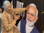 100-year-old Ramiben blessing PM Modi during the broadcast of 100th episode of 'Mann Ki Baat' in New Zealand's Auckland. 