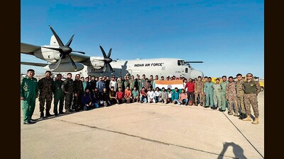 Indian nationals, evacuated from war-torn Sudan under Operation Kaveri, prior to leaving for Delhi in an IAF C-130J aircraft, in Jeddah on Sunday. (HT HOTO) Indian nationals, evacuated from war-torn Sudan under Operation Kaveri, prior to leaving for Delhi in an IAF C-130J aircraft, in Jeddah on Sunday. (HT HOTO)