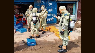 National Disaster Response Force team at the site after a gas leak incident in the Giaspura area, in Ludhiana district. (PTI) National Disaster Response Force team at the site after a gas leak incident in the Giaspura area, in Ludhiana district. (PTI)