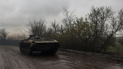 Russia-Ukraine War: A Ukrainian serviceman rides inside a BMP-1 infantry fighting vehicle on a road to the front line town of Bakhmut. (Reuters)