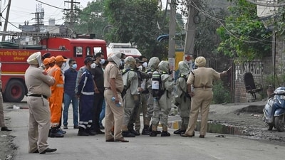 NDRF, police and medical teams engaged in rescue operation after gas leak incident at Sua road, Giaspura area in Ludhiana on Sunday. "Police, government and NDRF teams are present at the spot. All possible help is being extended to the affected. Rest details soon," Punjab CM Mann tweeted after the incident. (HT Photo)