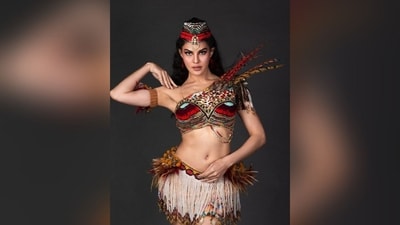 Jacqueline's outfit was truly remarkable, featuring a mini skirt adorned with elegant white tassels and a boho-style belt with various details on the side. The one-shoulder top was equally impressive, boasting a vibrant array of colors and multiple feathers and beads attached to it. (Instagram/@jacquelinef143 ) Jacqueline's outfit was truly remarkable, featuring a mini skirt adorned with elegant white tassels and a boho-style belt with various details on the side. The one-shoulder top was equally impressive, boasting a vibrant array of colors and multiple feathers and beads attached to it. (Instagram/@jacquelinef143 )