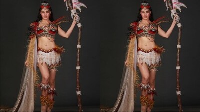 To complete her stunning look, Jacqueline added a floor-touching shrug with multiple feathers cascading down one side. The overall look is an exceptional blend of chic and tribal fashion. (Instagram/@jacquelinef143 ) To complete her stunning look, Jacqueline added a floor-touching shrug with multiple feathers cascading down one side. The overall look is an exceptional blend of chic and tribal fashion. (Instagram/@jacquelinef143 )