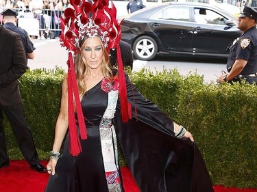 A headdress that inspired a thousand memes. Sarah Jessica Parker stretched her style credentials with this gown and that dress at the Met Gala. (File photo) A headdress that inspired a thousand memes. Sarah Jessica Parker stretched her style credentials with this gown and that dress at the Met Gala. (File photo)