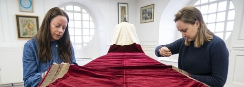 Royal School of Needlework workers engaged in embroidery of the royal robes. (Royal.UK) Royal School of Needlework workers engaged in embroidery of the royal robes. (Royal.UK)
