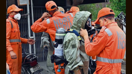 NDRF teams during a rescue operation in Giaspura, Ludhiana, on Sunday. (Gurpreet Singh/HT Photo)