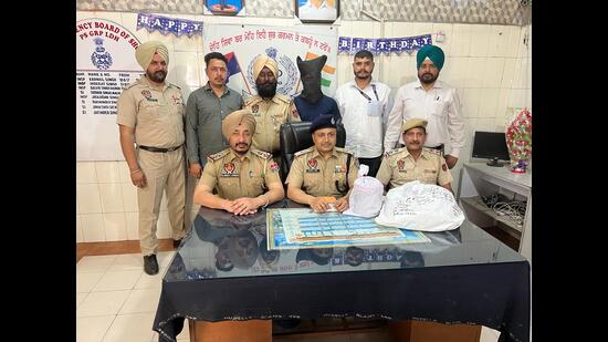 The accused in custody of police in Ludhiana on Sunday. (HT Photo)