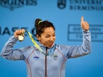 India's Mirabai Chanu with the gold medal after winning women's 49kg weightlifting category match of the Commonwealth Games 2022&nbsp;