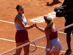 Tennis - Madrid Open - Park Manzanares, Madrid, Spain - May 1, 2023 Belarus' Aryna Sabalenka shakes hands with Russia's Mirra Andreeva after winning their round of 16 match REUTERS/Isabel Infantes