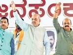 Union Ministers and senior BJP leaders Amit Shah and Pralhad Joshi (L) with Karnataka Chief Minister Basavaraj Bommai (R). (PTI)