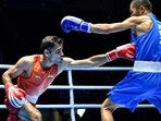 Indian boxer Mohd Hussamuddin (Red) in action. Indian boxer Mohd Hussamuddin (Red) in action.