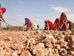 Village women labourers work at construction site Village women labourers work at construction site